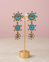 starburst blue dangler earrings by luqi arts (1).png
