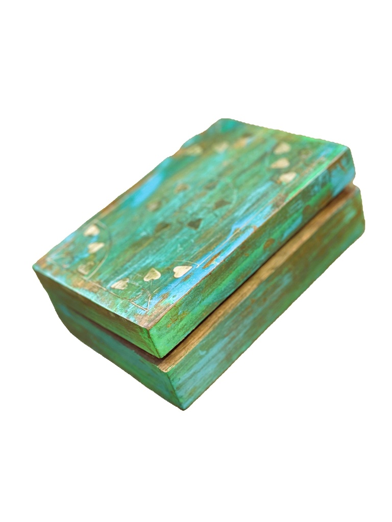 Hand carved box by Studio Inaara