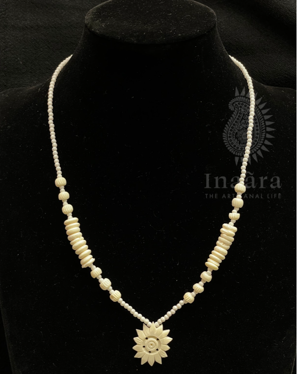 Beaded Necklace with Carved Flower Pendant